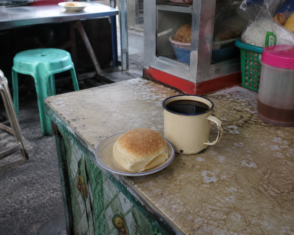 Karinderya barako coffee with pandesal at Lipa public market - everyday local breakfast. 