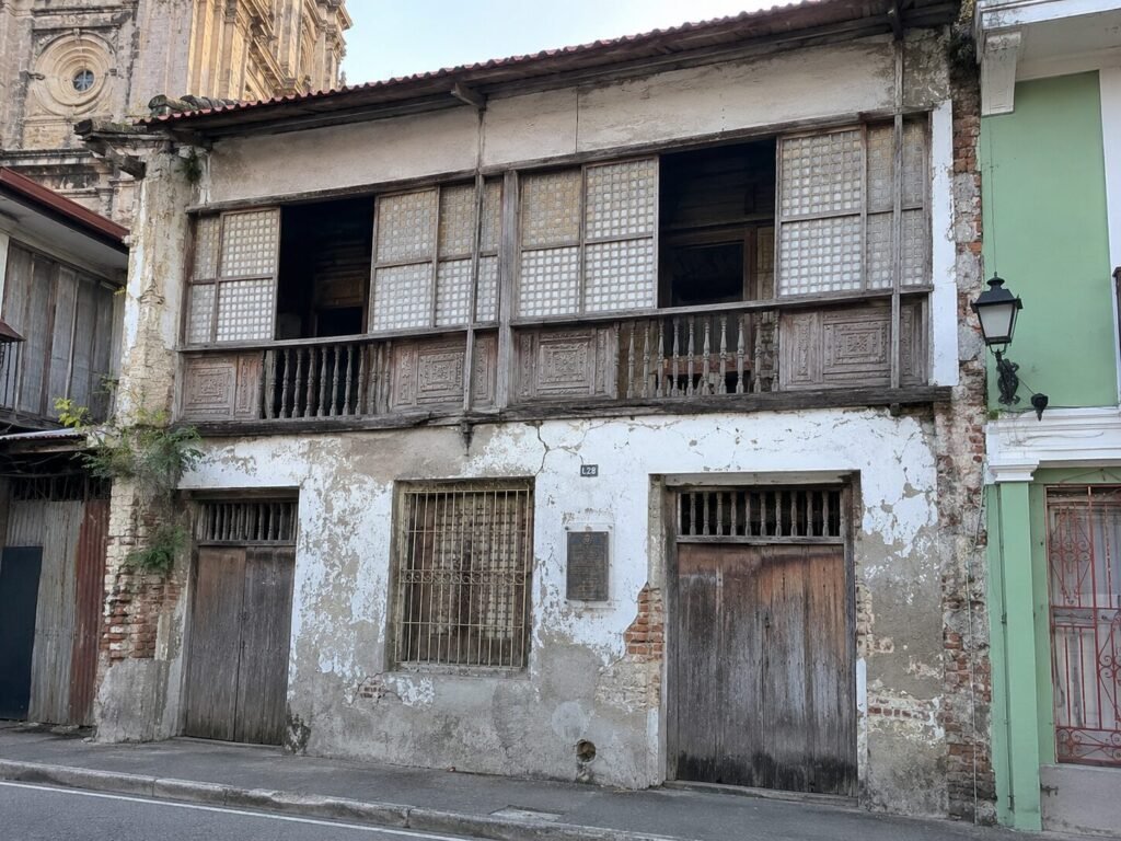"Spanish-era house facade in central Lipa City - bahay na bato architecture"